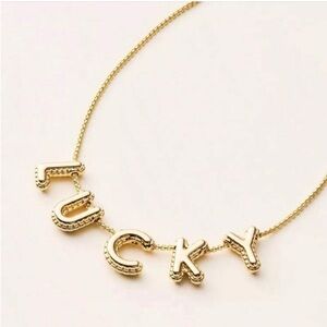 Kate Spade ♠️ Lucky Charms ! St Patrick’s Day Gold tone necklace with 5 charms.